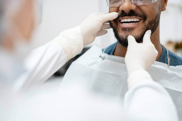 Patient at 479 Dental care being consulted about root canal treatment to restore tooth and remove pain