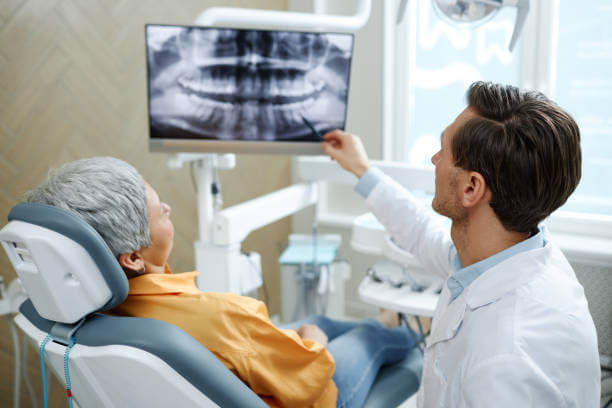 Patient receiving treatment planning with Dr. Grant at 479 Dental Care